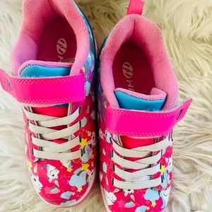 Girls Heelys! Very very gently used. Only worn a couple of times.